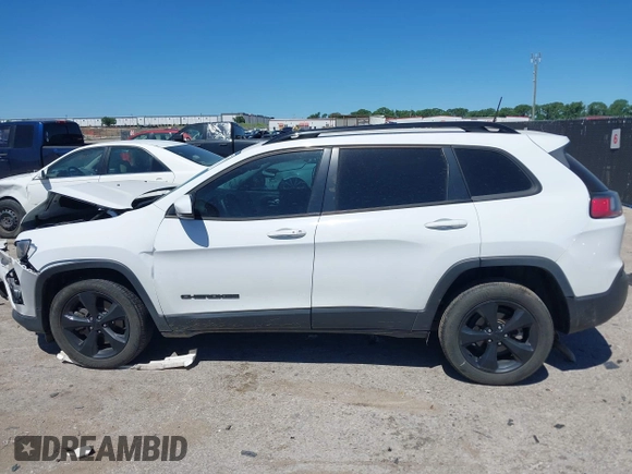 2021 Jeep Cherokee Altitude с VIN 1C4PJLLB0MD114041, выставлен на аукционе IAAI как лот 42293395 с пробегом 55 576 миль миль и . История ставок и продаж доступна на DreamBid. Изображение 14.