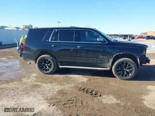 2015 Chevrolet Tahoe LTZ with VIN 1GNSCCKC4FR186632, listed as a IAAI auction lot 41482904 with 149,468 mi miles. Bid and sale history available at carsss.com. Image 14.