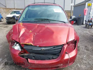 2006 Chrysler Town & Country with VIN 1A4GP45RX6B584391, listed as a IAAI auction lot 41882597 with 160,886 mi miles and . Bid and sale history available at DreamBid. Image 12.