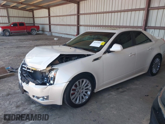 2013 Cadillac CTS Premium z VIN 1G6DS5E30D0105240, wystawiony jako IAAI lot #42145007 z przebiegiem 100 893 mil mil oraz . Historia ofert i sprzedaży dostępna na DreamBid. Obrazek 2.