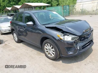 2014 Mazda CX-5 Sport with VIN JM3KE2BE0E0376646, listed as a IAAI auction lot 42483573 with 133,957 mi miles and . Bid and sale history available at DreamBid. Image 1.