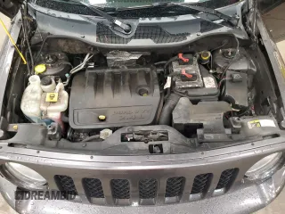 2016 Jeep Patriot High Altitude with VIN 1C4NJRFB5GD697474, listed as a Copart auction lot 57881215 with 152,127 mi miles and Salvage title. Bid and sale history available at DreamBid. Image 12.