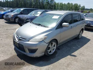 2010 Mazda 5 Sport with VIN JM1CR2WL3A0372322, listed as a IAAI auction lot 42354466 with 249,661 mi miles and . Bid and sale history available at DreamBid. Image 2.