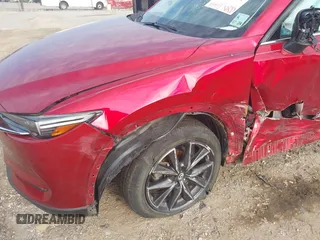 2017 Mazda CX-5 Grand Touring with VIN JM3KFADL8H0189033, listed as a IAAI auction lot 40029931 with 88,933 mi miles and . Bid and sale history available at carsss.com. Image 18.