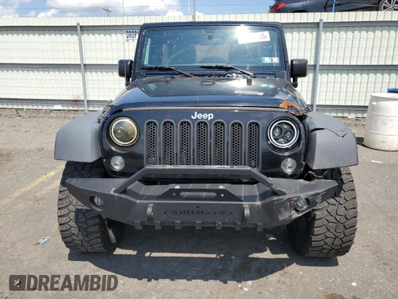 2015 Jeep Wrangler Unlimited Sport with VIN 1C4BJWDG1FL668395, listed as a Copart auction lot 64035035 with 79,972 mi miles and Salvage title. Bid and sale history available at DreamBid. Image 5.