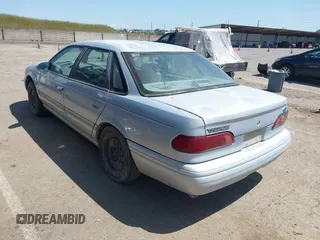 1994 Ford Taurus GL z VIN 1FALP5242RG144553, wystawiony jako IAAI lot #42084759 z przebiegiem 45 059 mil mil oraz . Historia ofert i sprzedaży dostępna na DreamBid. Obrazek 3.