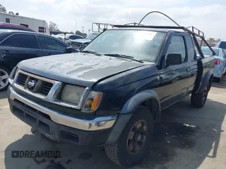 1999 Nissan Frontier XE z VIN 1N6ED26Y5XC321492, wystawiony jako IAAI lot #42116307 z przebiegiem 446 841 mil mil oraz . Historia ofert i sprzedaży dostępna na DreamBid. Obrazek 2.