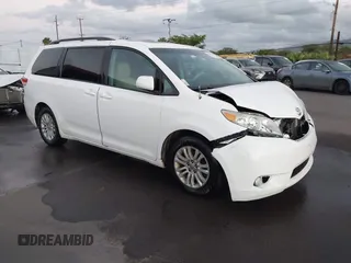 2014 Toyota Sienna XLE with VIN 5TDYK3DC1ES429932, listed as a IAAI auction lot 41692134 with 93,625 mi miles. Bid and sale history available at carsss.com. Image 1.