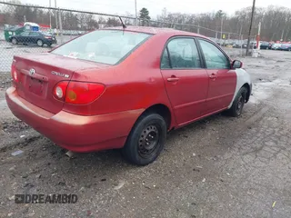 2004 Toyota Corolla CE with VIN 2T1BR38E94C195785, listed as a IAAI auction lot 41836231 with 299,999 mi miles. Bid and sale history available at carsss.com. Image 4.