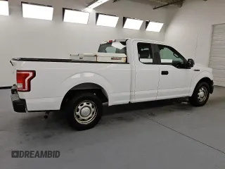 2015 Ford F-150 XL with VIN 1FTEX1C8XFKE23089, listed as a Copart auction lot 57988775 with 155,806 mi miles and Clean title. Bid and sale history available at DreamBid. Image 3.