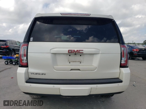 2015 GMC Yukon SLT z VIN 1GKS1BKC4FR552523, wystawiony jako Copart lot #54658135 z przebiegiem 93 907 mil mil oraz Czysty tytuł • Clean title. Historia ofert i sprzedaży dostępna na DreamBid. Obrazek 6.