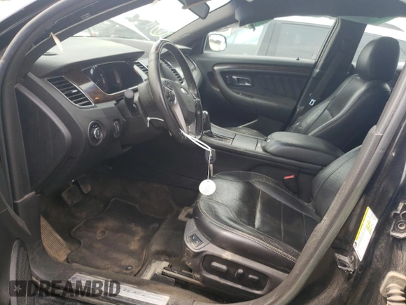 2013 Ford Taurus Limited z VIN 1FAHP2F80DG210284, wystawiony jako Copart lot #60356585 z przebiegiem 163 750 mil mil oraz Szkoda całkowita • Salvage title. Historia ofert i sprzedaży dostępna na DreamBid. Obrazek 7.
