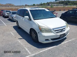 2007 Honda Odyssey EX-L z VIN 5FNRL38767B090235, wystawiony jako IAAI lot #42385171 z przebiegiem 203 979 mil mil oraz . Historia ofert i sprzedaży dostępna na DreamBid. Obrazek 1.