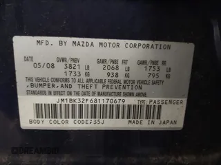 2008 Mazda Mazda3 i Touring Value with VIN JM1BK32F681170679, listed as a IAAI auction lot 42211170 with 129,051 mi miles. Bid and sale history available at carsss.com. Image 9.