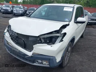 2019 Honda Ridgeline RTL-E with VIN 5FPYK3F75KB020713, listed as a IAAI auction lot 42191152 with 31,245 mi miles and . Bid and sale history available at DreamBid. Image 6.