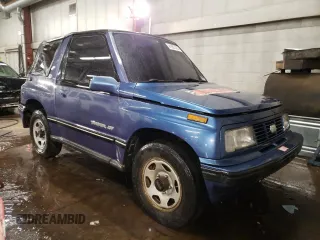1995 Chevrolet Tracker z VIN 2CNBJ1866S6934268, wystawiony jako Copart lot #41997375 z przebiegiem 152 848 mil mil oraz Szkoda całkowita • Salvage title. Historia ofert i sprzedaży dostępna na DreamBid. Obrazek 4.