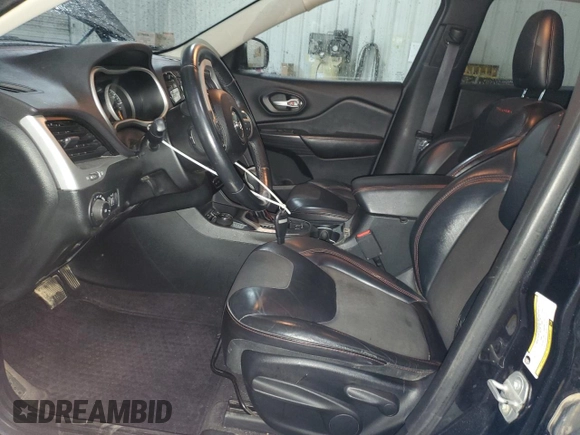 2016 Jeep Cherokee Trailhawk with VIN 1C4PJMBS7GW337774, listed as a Copart auction lot 55184885 with 161,567 mi miles and Salvage title. Bid and sale history available at DreamBid. Image 7.