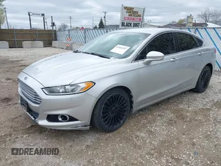 2014 Ford Fusion Titanium with VIN 3FA6P0K92ER367576, listed as a IAAI auction lot 42062207 with 171,351 mi miles. Bid and sale history available at carsss.com. Image 2.