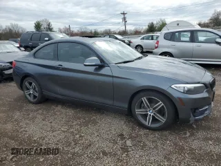 2017 BMW 2 Series 230i with VIN WBA2F9C52HV664153, listed as a Copart auction lot 51953875 with 71,904 mi miles and Salvage title. Bid and sale history available at DreamBid. Image 4.