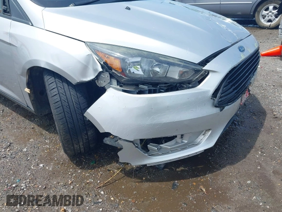 2017 Ford Focus SE with VIN 1FADP3FE4HL295573, listed as a IAAI auction lot 39562568 with 96,939 mi miles and . Bid and sale history available at carsss.com. Image 18.