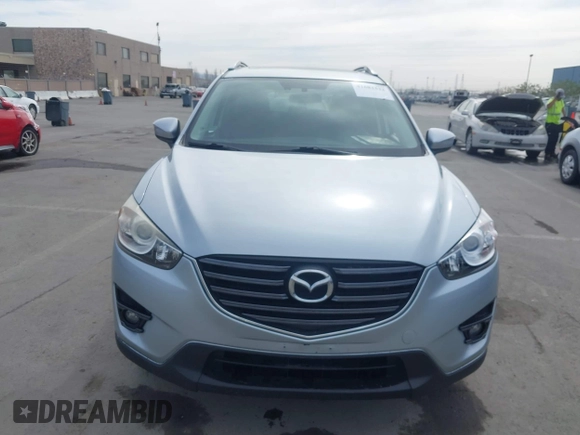 2016 Mazda CX-5 Grand Touring with VIN JM3KE2DY9G0723921, listed as a IAAI auction lot 41681522 with 83,893 mi miles. Bid and sale history available at carsss.com. Image 12.