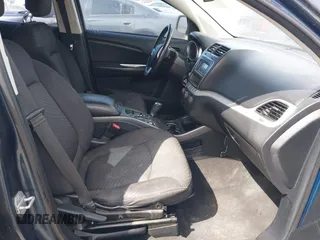 2014 Dodge Journey American Value Pkg with VIN 3C4PDCAB7ET101132, listed as a IAAI auction lot 41802381 with 101,895 mi miles. Bid and sale history available at carsss.com. Image 5.