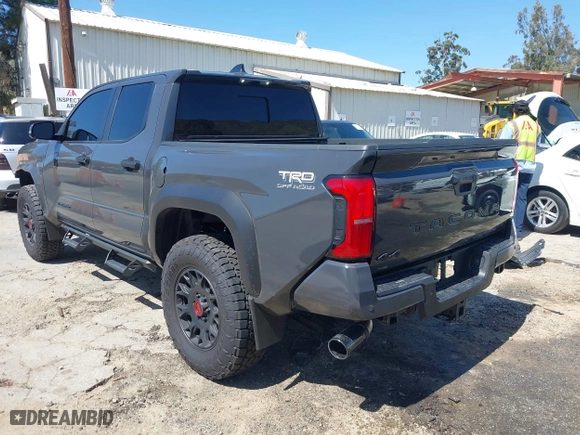2024 Toyota Tacoma 4WD SR5 with VIN 3TMLB5JN4RM039036, listed as a IAAI auction lot 41813562 with 2,112 mi miles. Bid and sale history available at carsss.com. Image 3.
