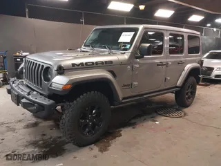 2019 Jeep Wrangler Unlimited Sahara with VIN 1C4HJXEGXKW574703, listed as a IAAI auction lot 41301603 with 43,433 mi miles. Bid and sale history available at carsss.com. Image 17.