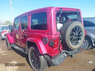 2021 Jeep Wrangler Unlimited Sahara with VIN 1C4JJXP63MW863995, listed as a IAAI auction lot 42037221 with 41,308 mi miles and . Bid and sale history available at DreamBid. Image 3.