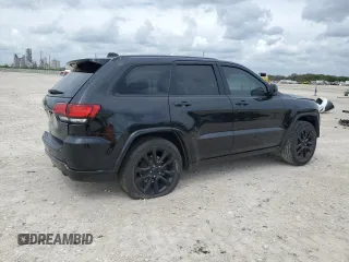 2018 Jeep Grand Cherokee Laredo E with VIN 1C4RJEAG4JC182430, listed as a Copart auction lot 50740255 with 117,944 mi miles and Salvage title. Bid and sale history available at DreamBid. Image 3.