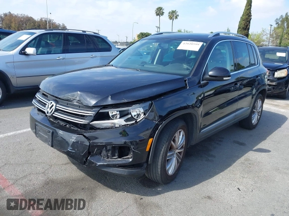 2015 Volkswagen Tiguan SE with VIN WVGAV7AX5FW509612, listed as a IAAI auction lot 42020599 with 64,201 mi miles and . Bid and sale history available at DreamBid. Image 2.
