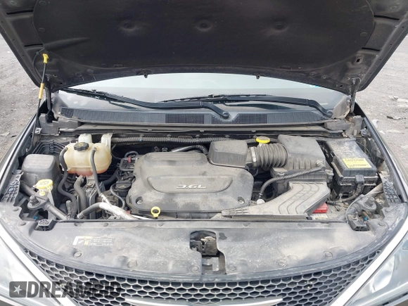 2017 Chrysler Pacifica Touring L with VIN 2C4RC1BG5HR705277, listed as a IAAI auction lot 42230036 with 75,287 mi miles and . Bid and sale history available at DreamBid. Image 10.