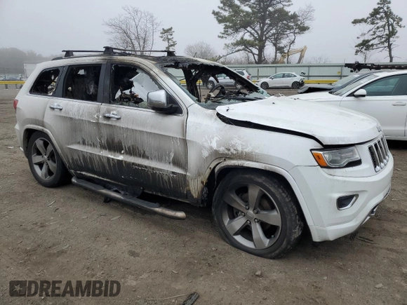 2015 Jeep Grand Cherokee Overland with VIN 1C4RJFCG8FC174325, listed as a Copart auction lot 51074475 with Not Provided miles and Salvage Title. Bid and sale history available at carsss.com. Image 4.