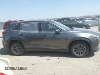 2021 Mazda CX-9 Touring with VIN JM3TCACY2M0502016, listed as a IAAI auction lot 41825456 with 86,068 mi miles and . Bid and sale history available at carsss.com. Image 13.