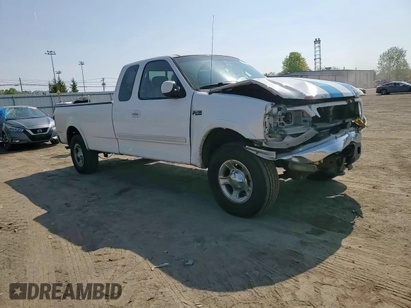 2002 Ford F-150 XL z VIN 1FTRX18LX2NA09494, wystawiony jako Copart lot #55255925 z przebiegiem 331 667 mil mil oraz Szkoda całkowita • Salvage title. Historia ofert i sprzedaży dostępna na DreamBid. Obrazek 13.