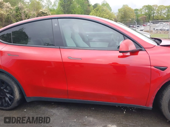 2021 Tesla Model Y Long Range with VIN 5YJYGDEE5MF085032, listed as a IAAI auction lot 41982925 with 64,541 mi miles and . Bid and sale history available at DreamBid. Image 13.