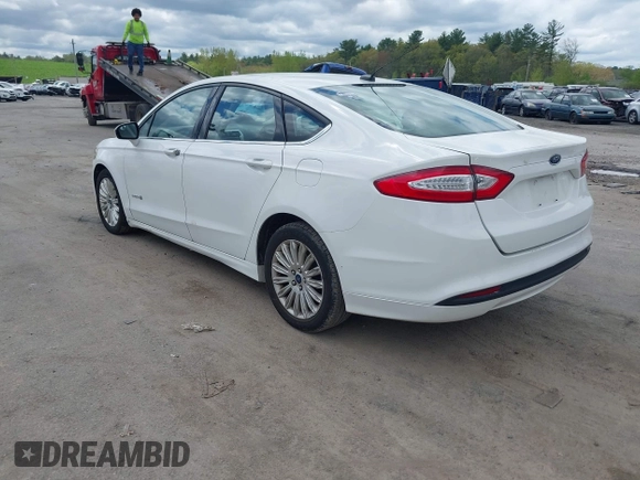 2013 Ford Fusion SE Hybrid with VIN 3FA6P0LUXDR328784, listed as a IAAI auction lot 42231399 with 169,462 mi miles and . Bid and sale history available at carsss.com. Image 3.