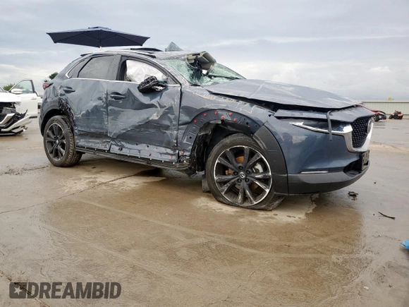 2023 Mazda CX-30 S Carbon Edition with VIN 3MVDMBCM7PM534442, listed as a Copart auction lot 60341565 with 15,068 mi miles and Salvage title. Bid and sale history available at DreamBid. Image 4.