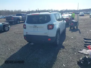 2017 Jeep Renegade Latitude with VIN ZACCJBBB8HPE64812, listed as a IAAI auction lot 41349525 with 106,966 mi miles. Bid and sale history available at carsss.com. Image 4.