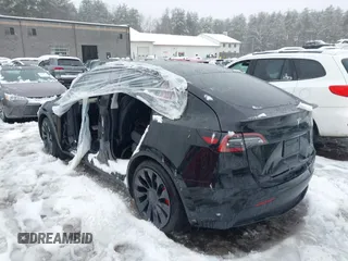 2023 Tesla Model Y Performance with VIN 7SAYGDEF4PF797192, listed as a IAAI auction lot 41550259 with 13,312 mi miles and . Bid and sale history available at DreamBid. Image 3.