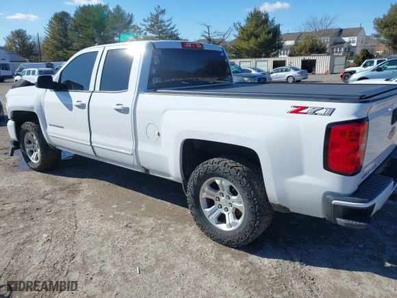 2018 Chevrolet Silverado 1500 LT with VIN 1GCVKREC5JZ350034, listed as a IAAI auction lot 41649277 with 112,673 mi miles. Bid and sale history available at carsss.com. Image 3.