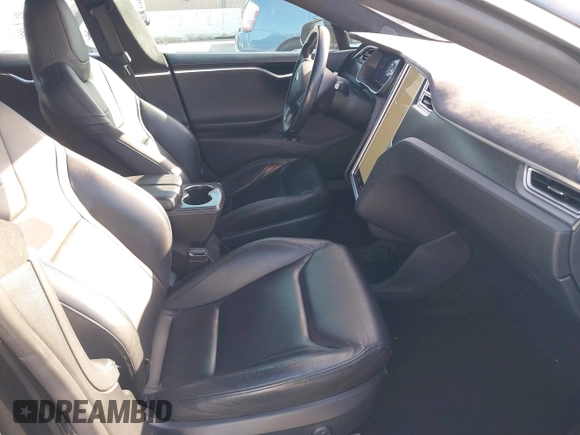 2014 Tesla Model S P85D with VIN 5YJSA1H22EFP65530, listed as a IAAI auction lot 41959941 with 76,532 mi miles and . Bid and sale history available at DreamBid. Image 5.