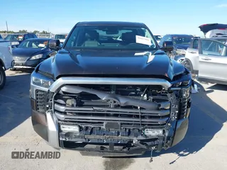 2023 Toyota Tundra Limited Hybrid with VIN 5TFJC5DB7PX032210, listed as a IAAI auction lot 41667443 with 18,390 mi miles and . Bid and sale history available at DreamBid. Image 12.