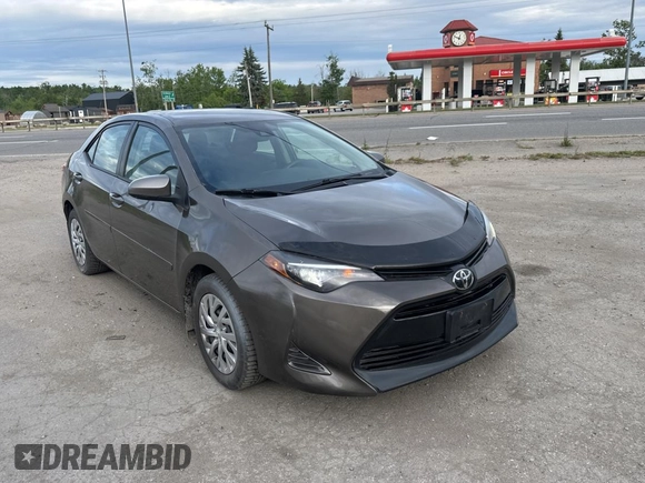 2019 Toyota Corolla L z VIN 2T1BURHE5KC220051, wystawiony jako Copart lot #61879415 z przebiegiem 196 200 mil mil oraz Czysty tytuł • Clean title. Historia ofert i sprzedaży dostępna na DreamBid. Obrazek 1.
