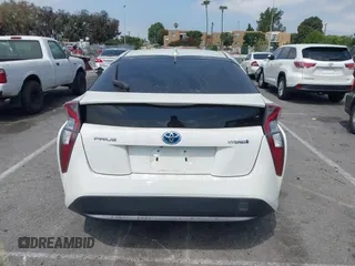 2016 Toyota Prius Two z VIN JTDKBRFU3G3024092, wystawiony jako IAAI lot #42338381 z przebiegiem 87 216 mil mil oraz . Historia ofert i sprzedaży dostępna na DreamBid. Obrazek 16.