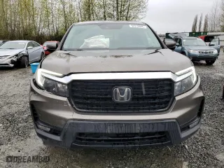 2021 Honda Ridgeline RTL-E with VIN 5FPYK3F78MB016027, listed as a Copart auction lot 52218845 with 67,428 mi miles and Salvage Title. Bid and sale history available at carsss.com. Image 5.