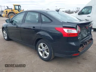 2012 Ford Focus SE with VIN 1FAHP3F25CL446064, listed as a IAAI auction lot 41883353 with 142,468 mi miles. Bid and sale history available at carsss.com. Image 3.