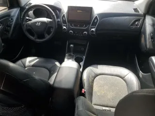 2010 Hyundai Tucson GLS with VIN KM8JU3AC2AU079129, listed as a Copart auction lot 54312875 with 116,659 mi miles and Salvage Title. Bid and sale history available at DreamBid. Image 8.