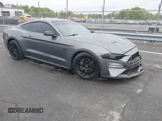 2021 Ford Mustang GT z VIN 1FA6P8CF0M5105060, wystawiony jako IAAI lot #41967671 z przebiegiem 27 626 mil mil oraz . Historia ofert i sprzedaży dostępna na DreamBid. Obrazek 1.