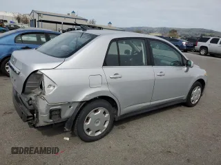 2009 Nissan Versa 1.8 S with VIN 3N1BC11E69L374261, listed as a Copart auction lot 47252795 with 70,600 mi miles and Salvage Title. Bid and sale history available at carsss.com. Image 3.